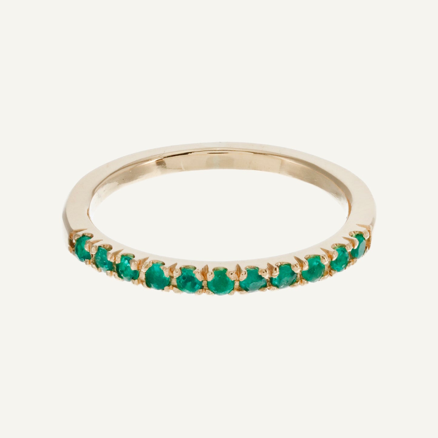 ANILLO TIRA DE ESMERALDAS ORO 18K