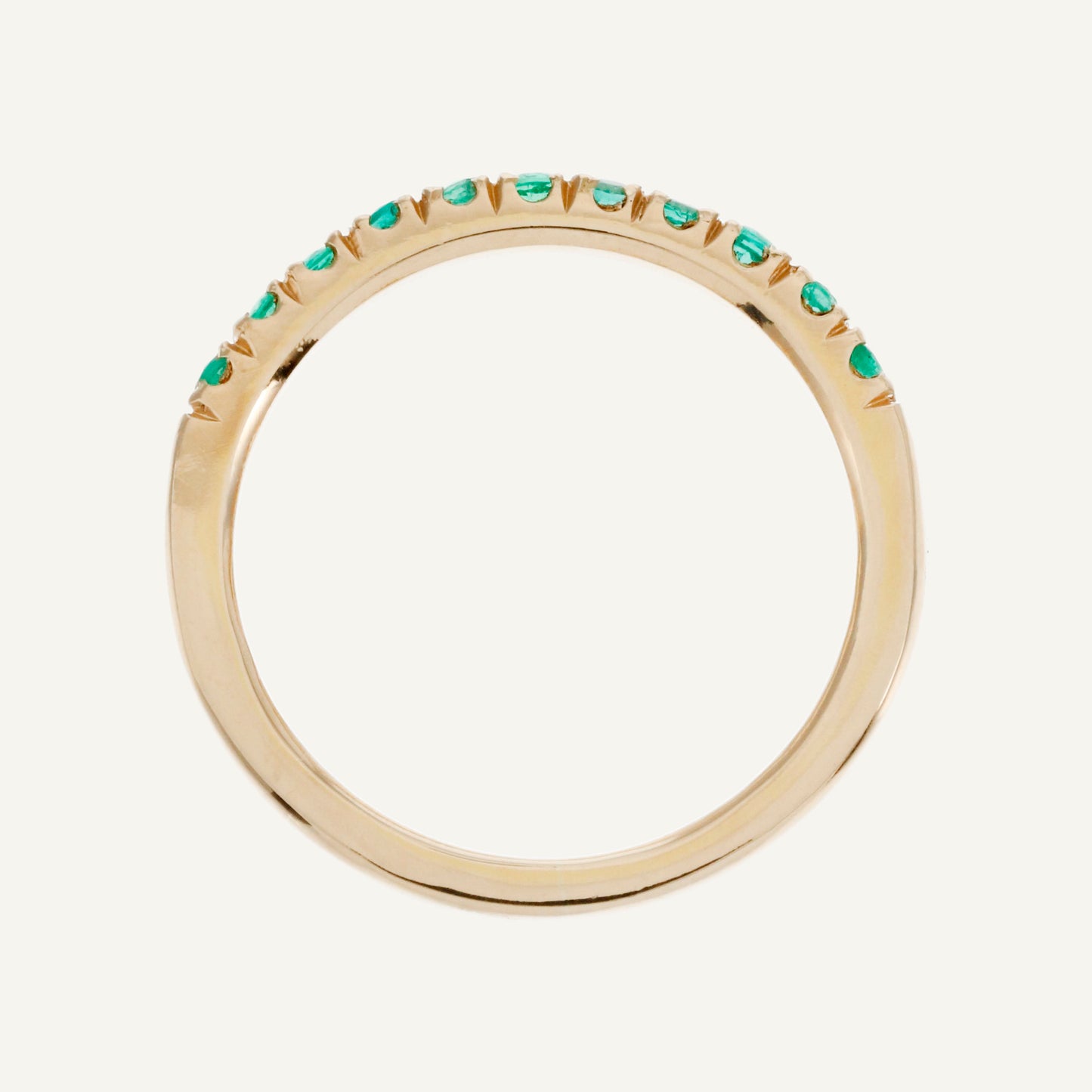ANILLO TIRA DE ESMERALDAS ORO 18K